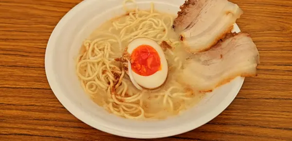 ラーメンEXPO 2025 麺匠大阪らーめん しおじん(大阪)のOsaka shio (salt) ramen with pork belly and egg